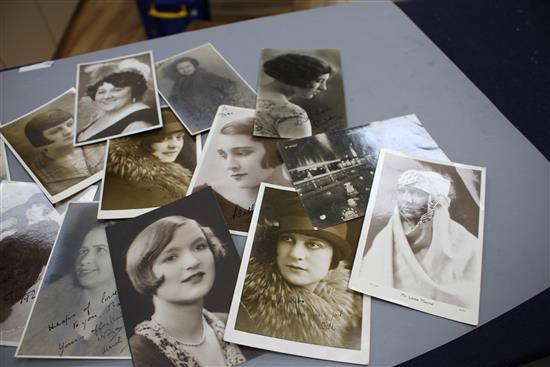 A collection of approximately forty autographed photographs and postcards of early 20th century entertainers including Gracie Fields,